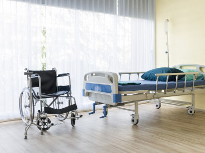 hospital-room-with-empty-bed-infusion-set-intravenous-fluid-wheelchairs.jpg