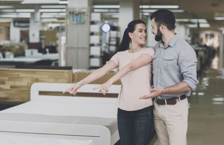 a-couple-chooses-a-mattress-in-the-store.jpg