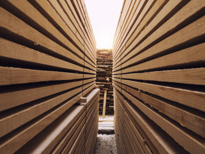 stack-of-wooden-planks-in-sawmill-lumber-yard.jpg