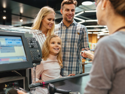 young-family-paying-with-a-credit-card.jpg